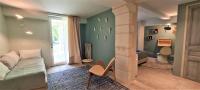 Ein Sitzbereich in der Unterkunft Villa Aigarden maison d&#39;hôtes