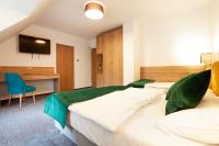 Posteľ alebo postele v izbe v ubytovaní Willa Pod Janowcem SPORT - REST & SPA
