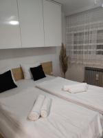 Posteľ alebo postele v izbe v ubytovaní LOLA HOME