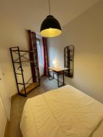 Posteľ alebo postele v izbe v ubytovaní LE LOFT et le T2, Le Mont Dore, au pied de La Dordogne