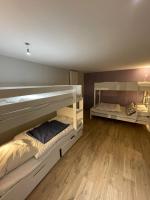 Posteľ alebo postele v izbe v ubytovaní LE LOFT et le T2, Le Mont Dore, au pied de La Dordogne