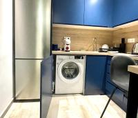 A kitchen or kitchenette at Dreamy Apartment City Center 11 thesbnbgr