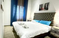 A bed or beds in a room at Dreamy Apartment City Center 11 thesbnbgr