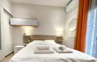 A bed or beds in a room at Dreamy Apartment City Center 11 thesbnbgr