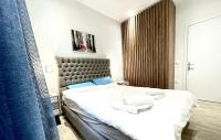 A bed or beds in a room at Dreamy Apartment City Center 11 thesbnbgr