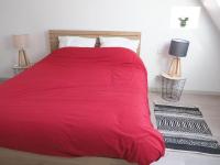 Łóżko lub łóżka w pokoju w obiekcie Appartement duplex et terrasse à St Servan-St Malo
