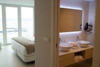 Postel nebo postele na pokoji v ubytování Otantus Hotel