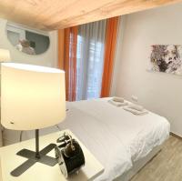 A bed or beds in a room at Dreamy Apartment City Center 11 thesbnbgr