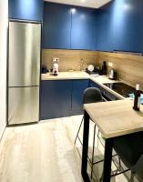 A kitchen or kitchenette at Dreamy Apartment City Center 11 thesbnbgr