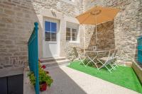 Patio lub wspólna przestrzeń na świeżym powietrzu w obiekcie Gîte le Champenois