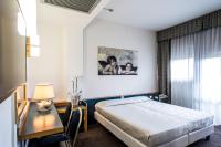 Posteľ alebo postele v izbe v ubytovaní Hotel Mirage