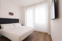 Posteľ alebo postele v izbe v ubytovaní Fiorentini Residence MILANO