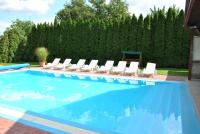 The swimming pool at or close to NAPSUGAR VENDÉGHÁZ