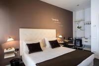 Posteľ alebo postele v izbe v ubytovaní Hotel Mirage