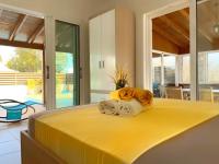 Postel nebo postele na pokoji v ubytování Tarracotta Villa 4 bedroom, near Ayia Napa