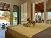 Postel nebo postele na pokoji v ubytování Tarracotta Villa 4 bedroom, near Ayia Napa