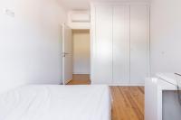 Postel nebo postele na pokoji v ubytování Comfy 3 Bedroom Apartment Campo de Ourique