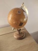 a globe on top of a wooden table at Chill Out Cabanon Coeur Calanques in Marseille