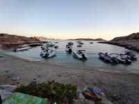 a group of boats are docked in the water at Chill Out Cabanon Coeur Calanques in Marseille