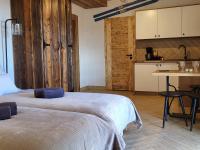 Posteľ alebo postele v izbe v ubytovaní Apartamenty Stylo
