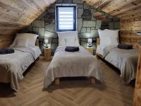 Posteľ alebo postele v izbe v ubytovaní Apartamenty Stylo