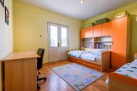 Posteľ alebo postele v izbe v ubytovaní The apartments consists of two bedrooms, a bathroom, a kitchen and a living room