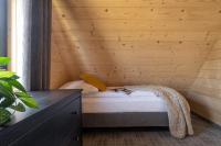 Posteľ alebo postele v izbe v ubytovaní Furmanova Chalets