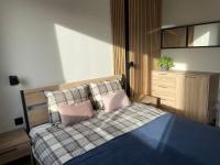 Postel nebo postele na pokoji v ubytování Apartament górski 595