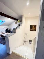 Televízia a/alebo spoločenská miestnosť v ubytovaní Pin's - Magnifique appartement