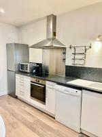 Kuchyňa alebo kuchynka v ubytovaní Pin's - Magnifique appartement