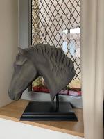 a statue of a horse in front of a window at Gite Oliveira&#39;s in Ury