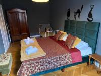 Posteľ alebo postele v izbe v ubytovaní Apartament Koci Łeb