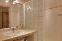 a bathroom with a sink and a mirror at Logis Le Vernay in Autrans