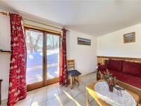 Część wypoczynkowa w obiekcie Appartement cosy aux Sybelles, grand extérieur, garage privé, proche pistes, parfait pour familles - FR-1-267-246