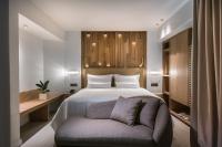 Dimargio Luxury Hotel & Spaにあるベッド