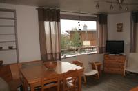 Televízia a/alebo spoločenská miestnosť v ubytovaní Appartement Courchevel 1650 pied des pistes