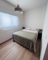 Posteľ alebo postele v izbe v ubytovaní Brandnew beachfront appartment