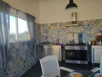 Kuchyň nebo kuchyňský kout v ubytování Habitaciones en Finca Olivo y Almendro