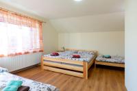 Postel nebo postele na pokoji v ubytování Apartmány Petra