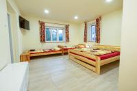 Postel nebo postele na pokoji v ubytování Apartmány Petra