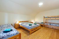 Postel nebo postele na pokoji v ubytování Apartmány Petra