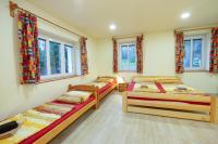 Postel nebo postele na pokoji v ubytování Apartmány Petra