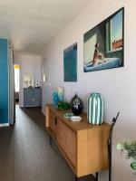 Telewizja i/lub zestaw kina domowego w obiekcie Bel Appartement vue mer SAINT BREVIN LES PINS