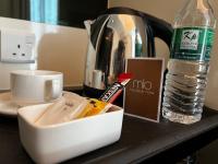 MIO BOUTIQUE Hotelにあるコーヒーまたはお茶