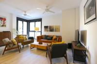 A television and/or entertainment centre at SOUL Malaga City Apartment