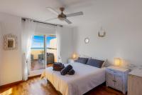 Posteľ alebo postele v izbe v ubytovaní Casa Rosado - Duplex Penthouse