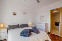 Posteľ alebo postele v izbe v ubytovaní Casa Rosado - Duplex Penthouse