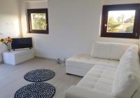 A seating area at Affittimoderni Avola La Perla