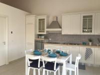 A kitchen or kitchenette at Affittimoderni Avola La Perla