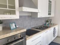 A kitchen or kitchenette at Affittimoderni Avola La Perla